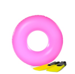 Photo of Inflatable ring and flippers on white background. Summer holidays