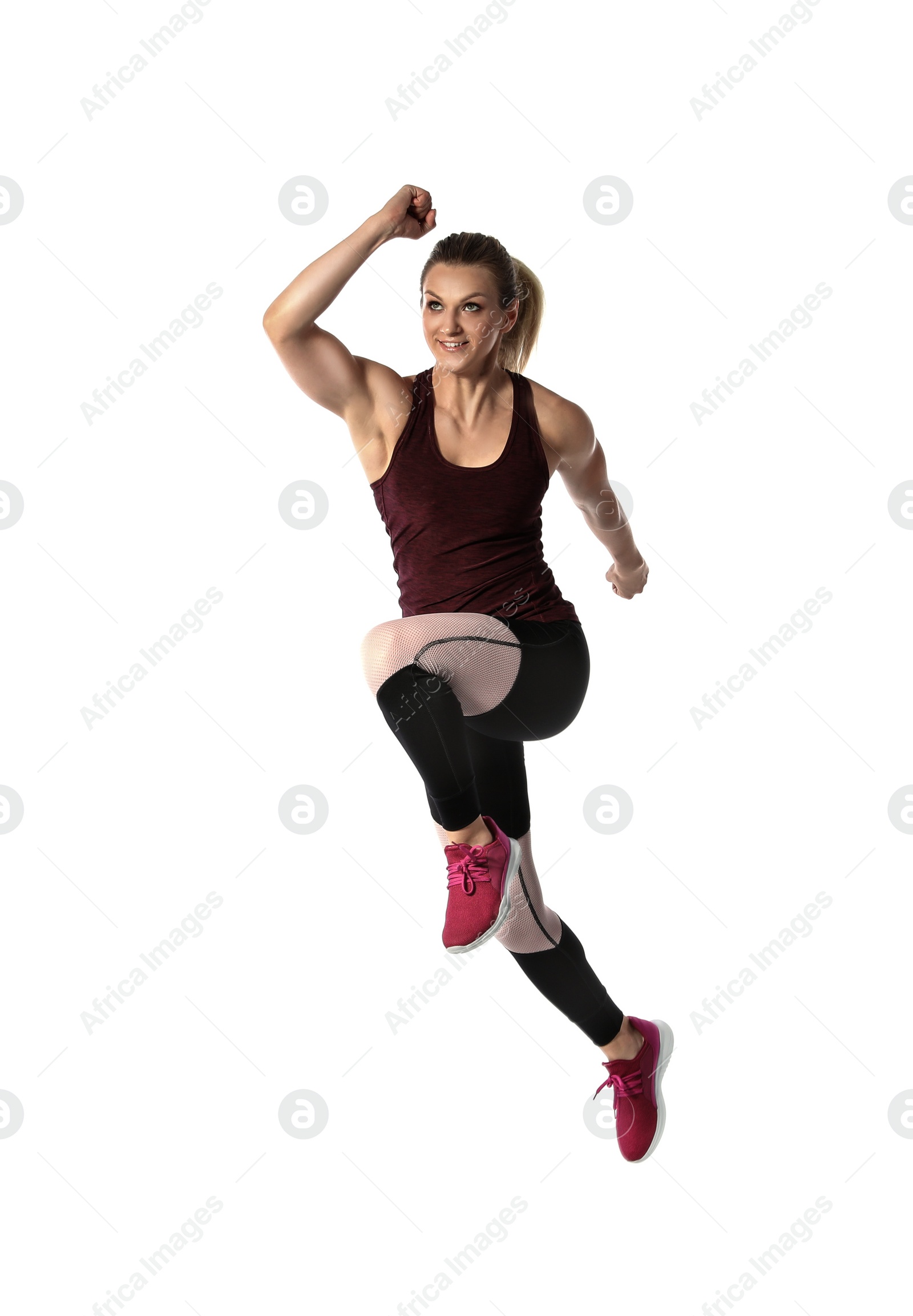 Photo of Sporty young woman running on white background