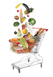 Image of Market assortment. Different products falling into shopping cart on white background