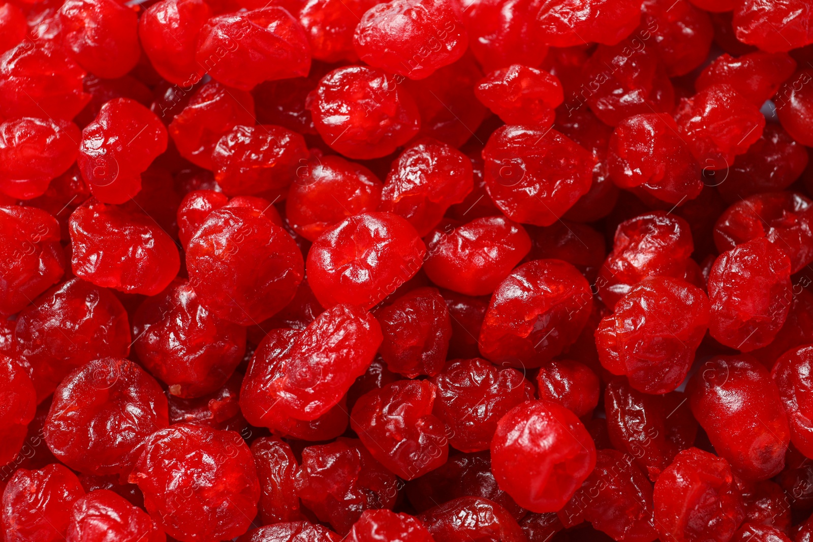 Photo of Heap of sweet cherries, closeup. Dried fruit as healthy snack