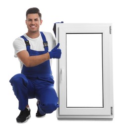 Photo of Worker with plastic window on white background. Installation service