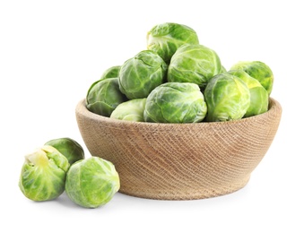 Fresh Brussels sprouts in bowl isolated on white