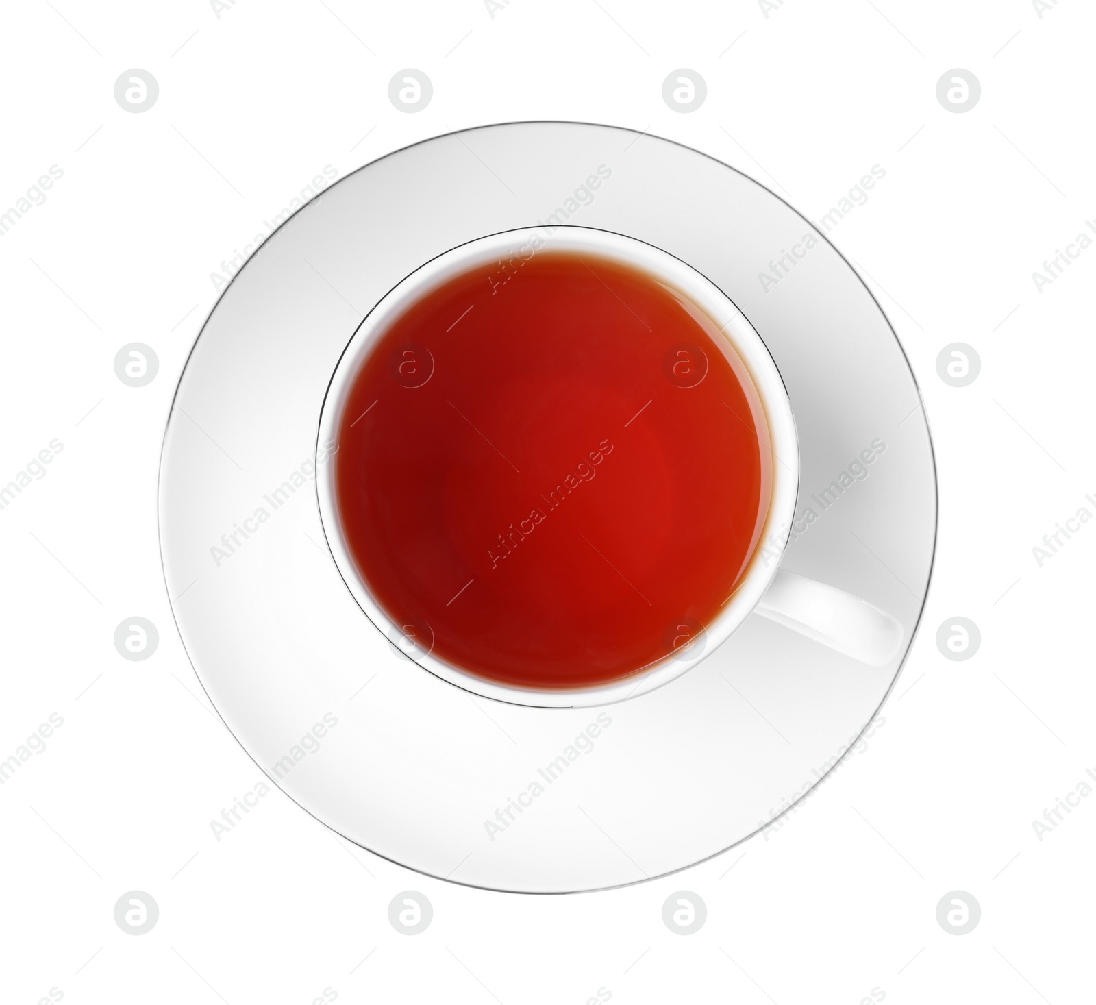 Photo of Ceramic cup of aromatic rooibos tea isolated on white, top view