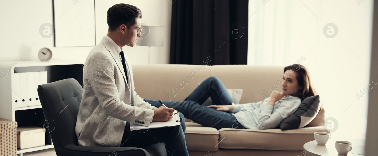 Image of Professional psychotherapist working with patient in office. Banner design