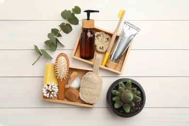 Photo of Flat lay composition with eco friendly products on white wooden table