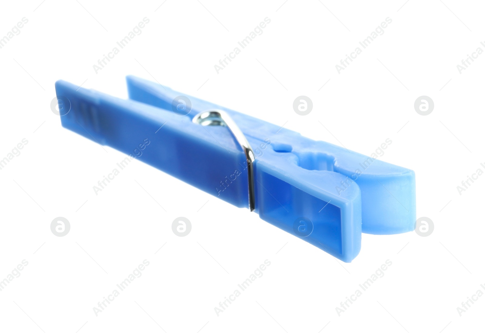 Photo of Bright light blue plastic clothespin isolated on white