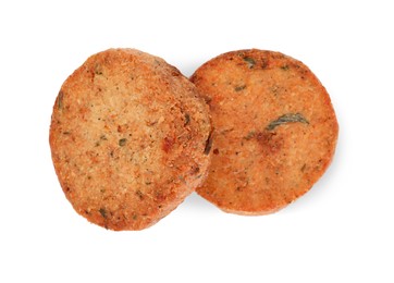 Delicious vegan cutlets on white background, top view