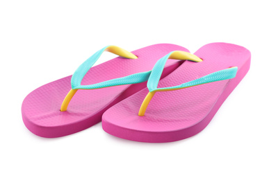 Pair of stylish pink flip flops isolated on white. Beach object