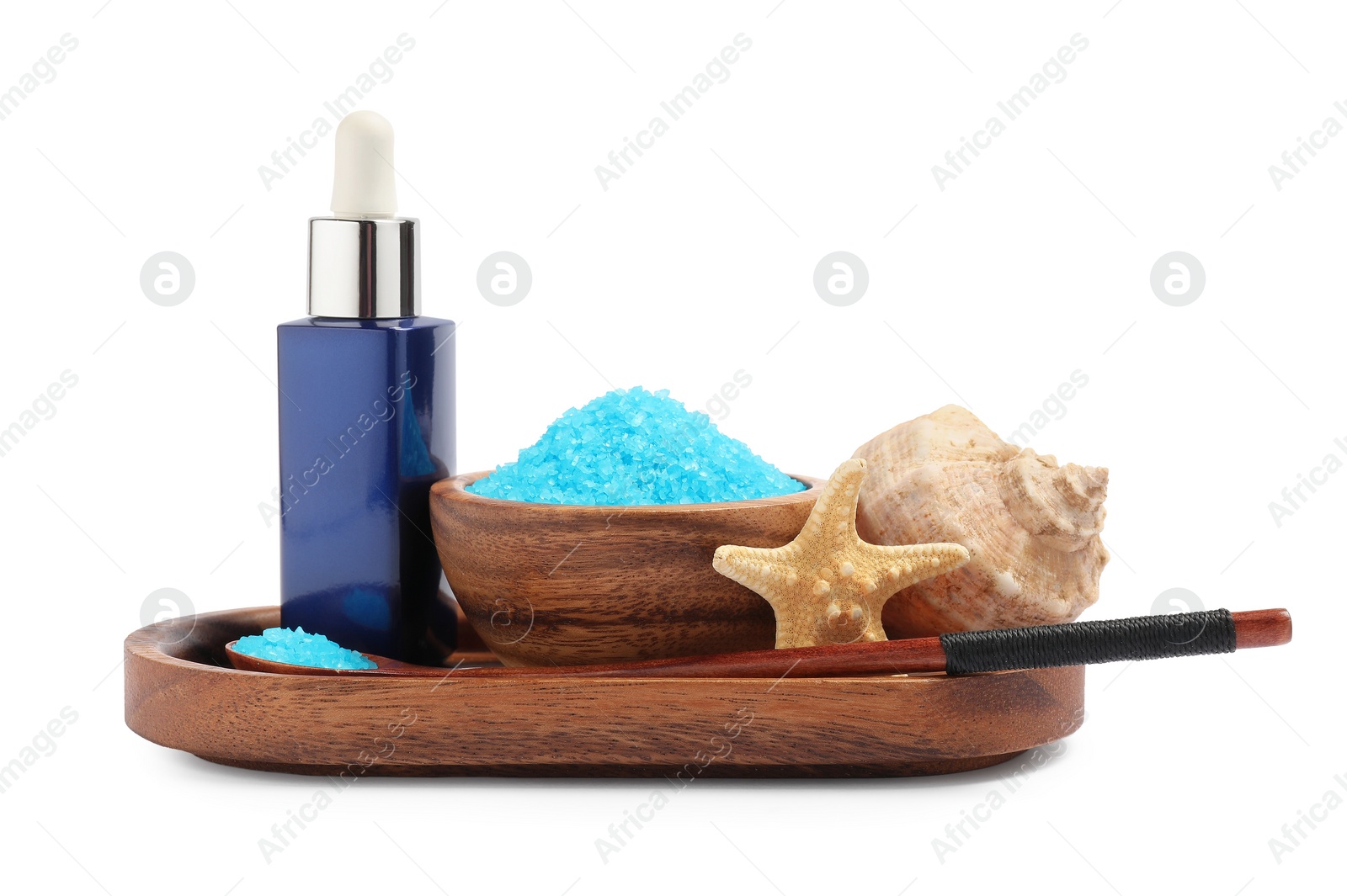 Photo of Light blue sea salt in bowl, shell, starfish and cosmetic product isolated on white