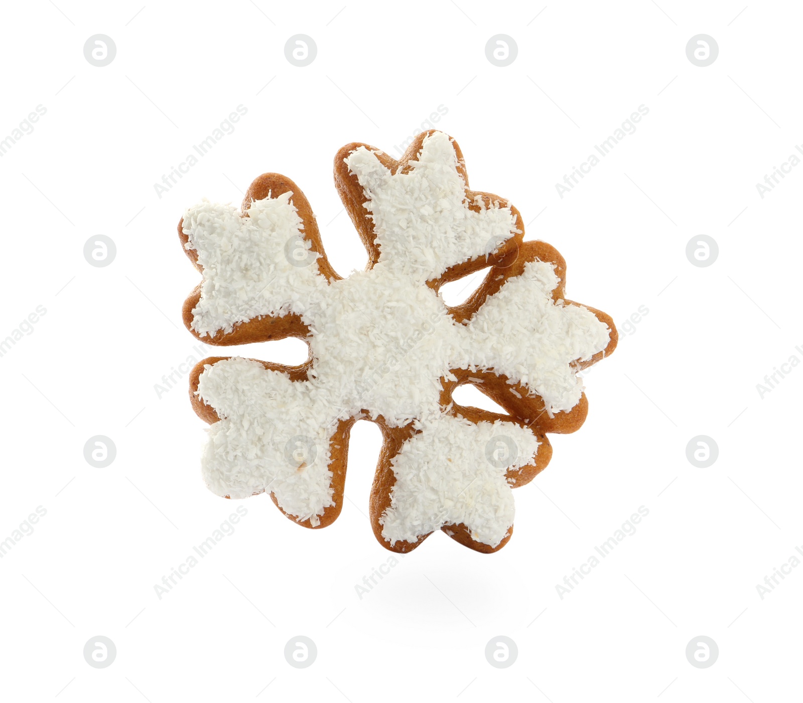 Photo of Snowflake shaped Christmas cookie isolated on white