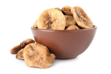 Bowl and dried figs on white background