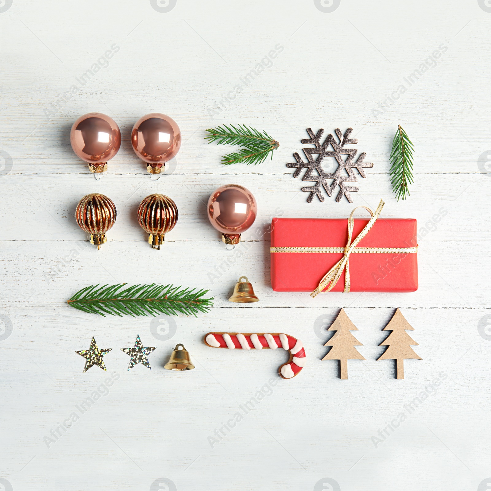 Photo of Flat lay composition with Christmas decor on white wooden background