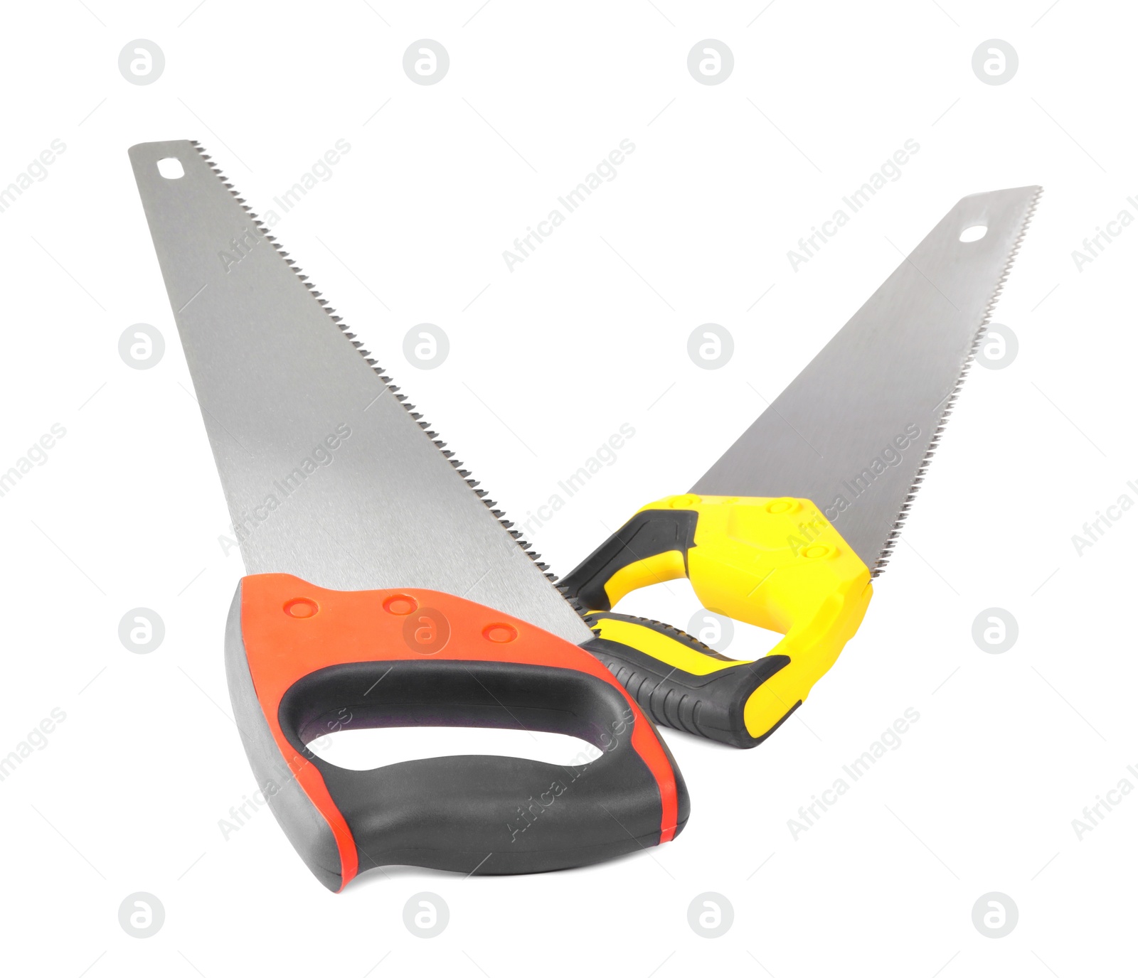 Photo of Saws with colorful handles isolated on white