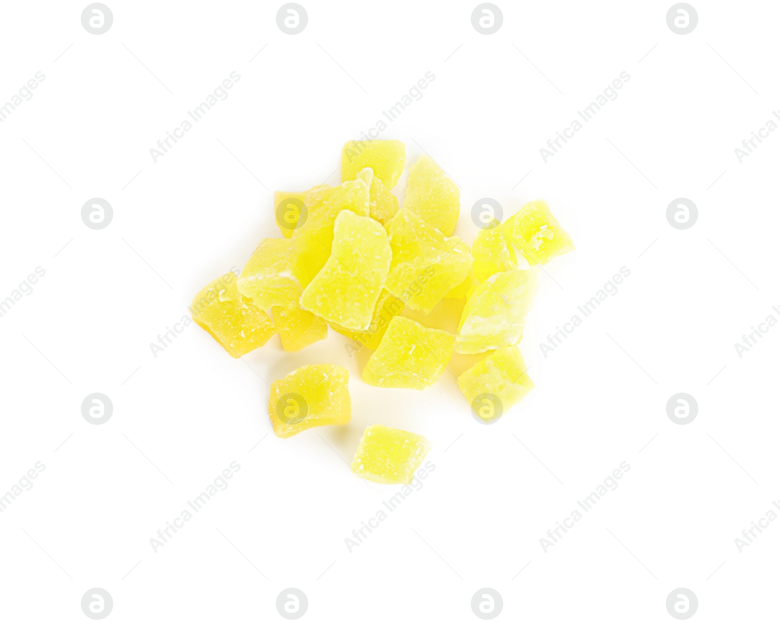 Photo of Delicious yellow candied fruit pieces on white background, top view