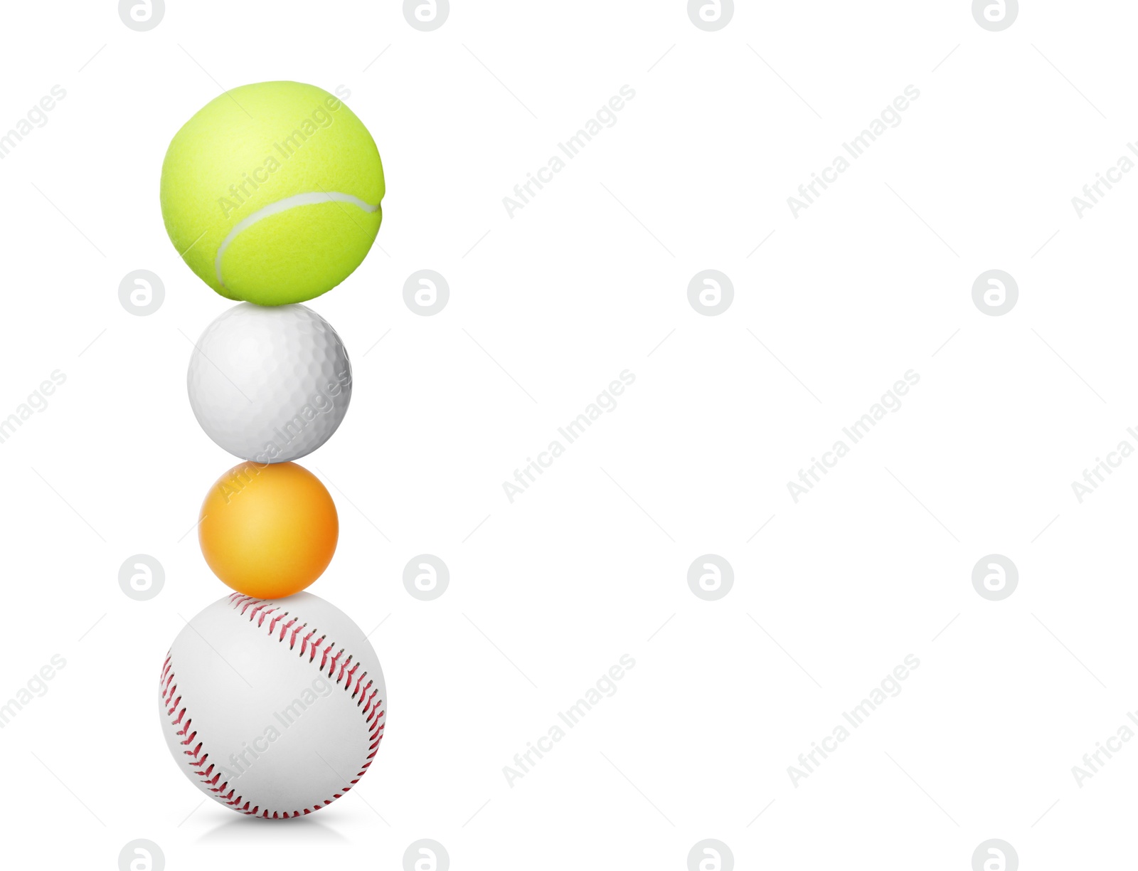 Image of Stack of different sport balls on white background