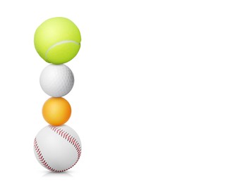 Stack of different sport balls on white background