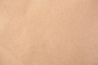 Sheet of kraft paper as background, top view