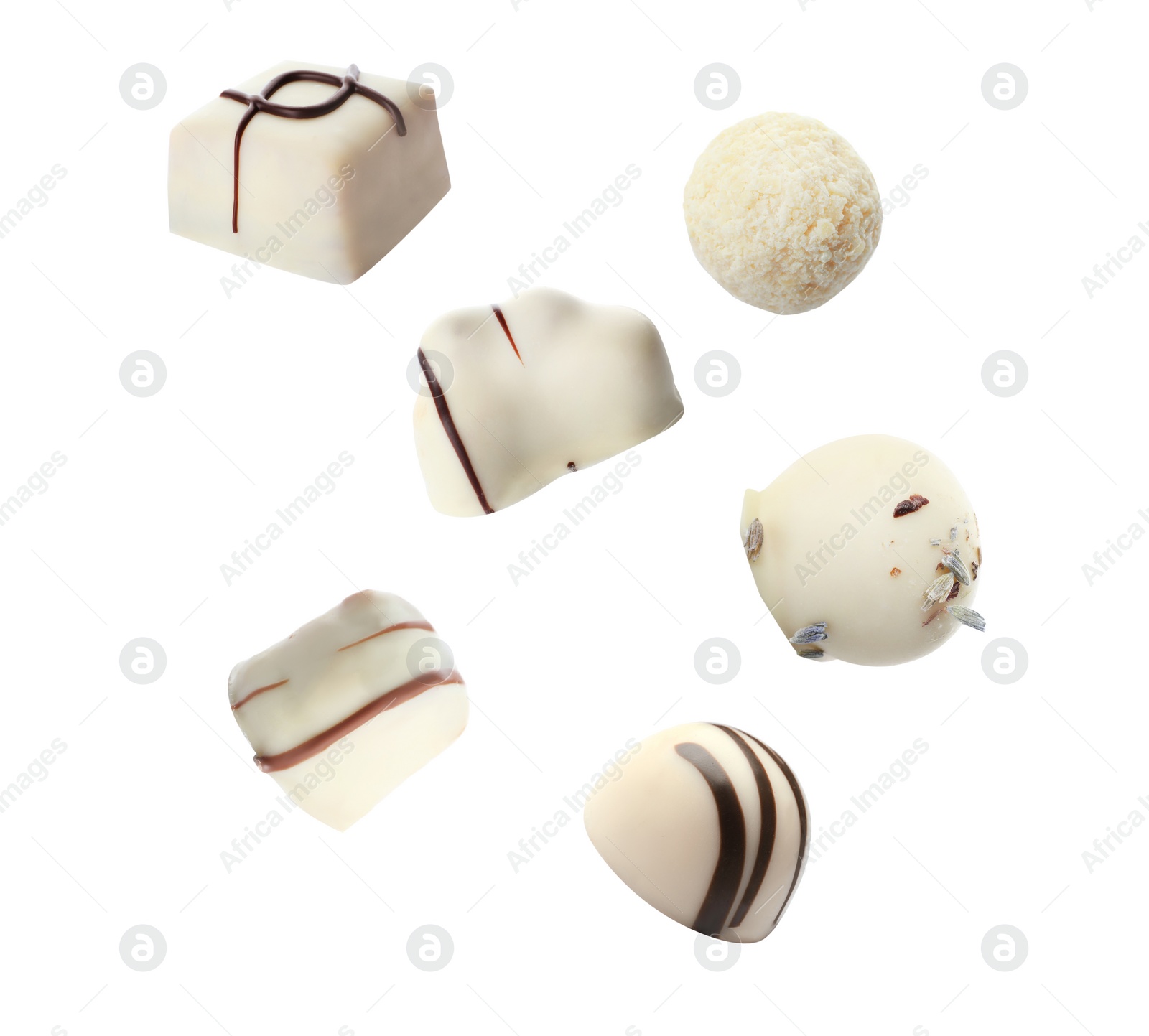 Image of Falling different chocolate candies on white background