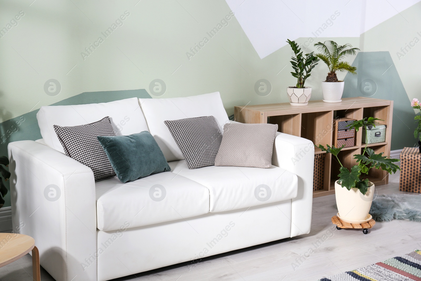 Photo of Living room interior with comfortable sofa