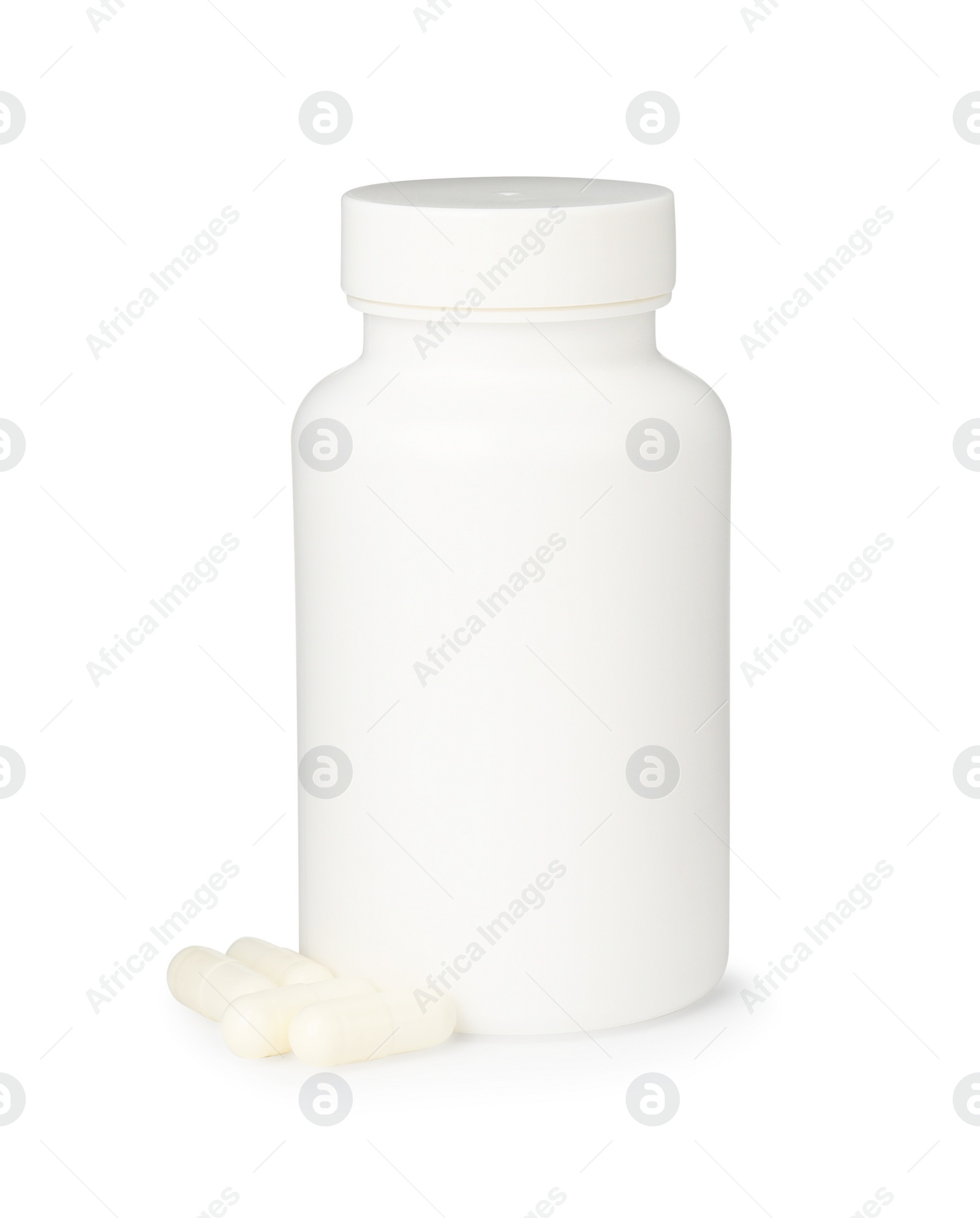 Photo of Blank jar and vitamin capsules isolated on white