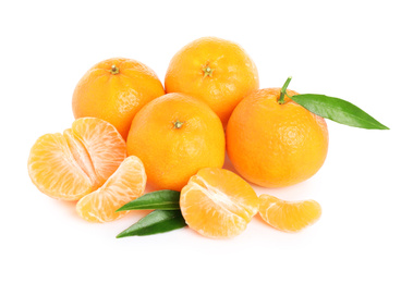 Fresh juicy tangerines with green leaves isolated on white