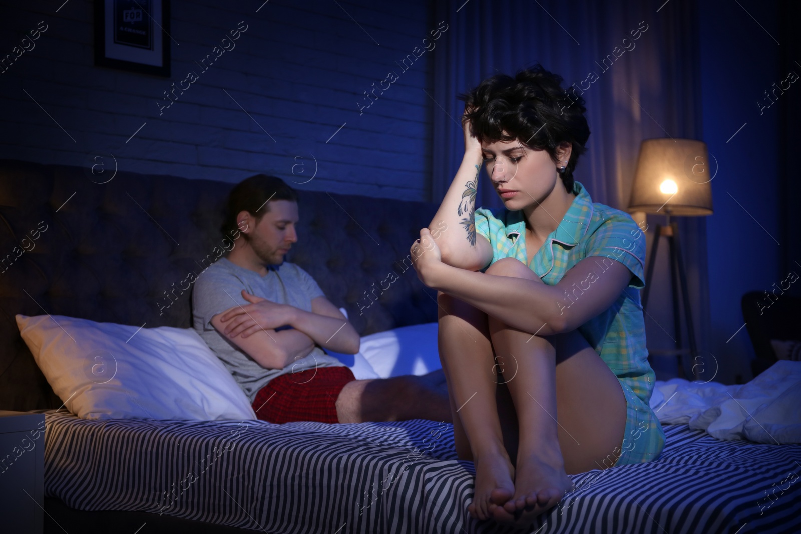 Photo of Young couple with relationship problem at home
