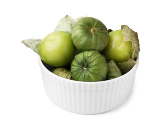 Photo of Bowl of fresh green tomatillos with husk isolated on white