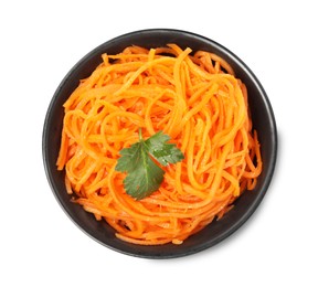 Photo of Delicious Korean carrot salad with parsley in bowl isolated on white, top view