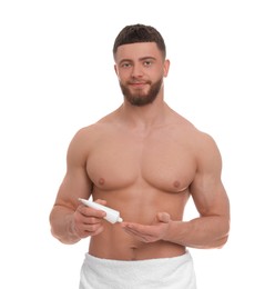 Handsome man applying body cream on white background