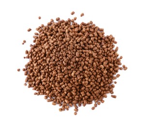 Photo of Pile of buckwheat tea granules on white background, top view