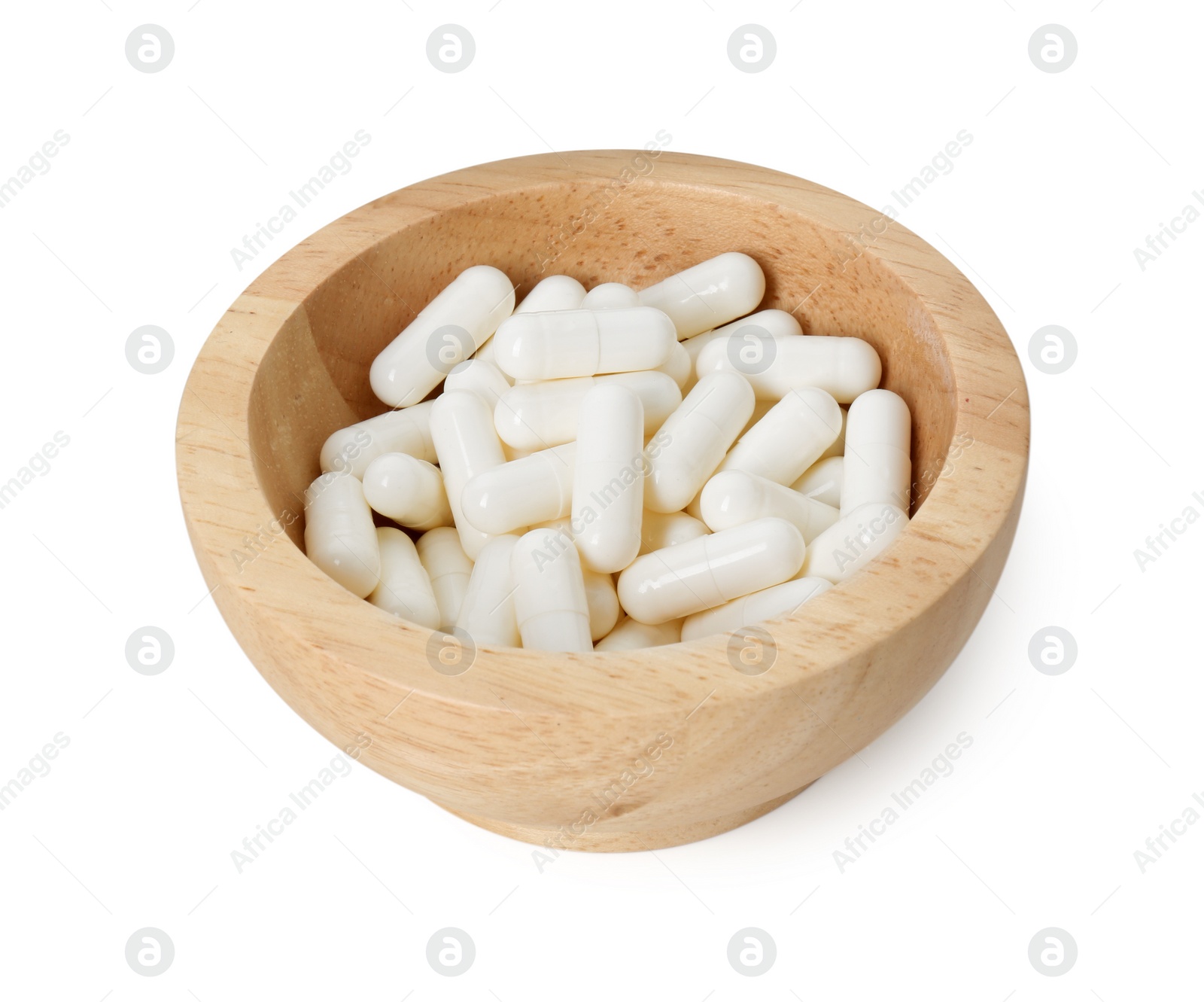 Photo of Vitamin capsules in bowl isolated on white. Health supplement