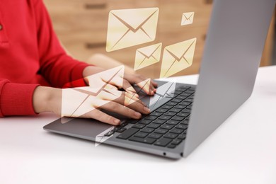 Woman typing on laptop at table indoors, closeup. Many illustrations of envelope as incoming messages over device