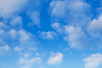 Picturesque view of beautiful fluffy clouds in light blue sky