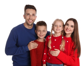 Photo of Happy family in warm clothes on white background. Winter season