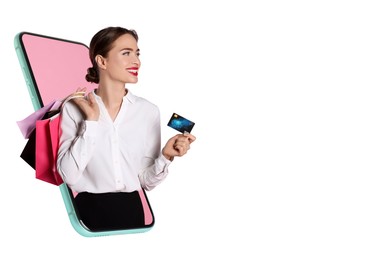 Image of Online shopping. Happy woman with paper bags and credit card looking out from smartphone on white background