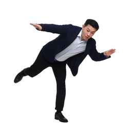 Businessman in suit posing on white background