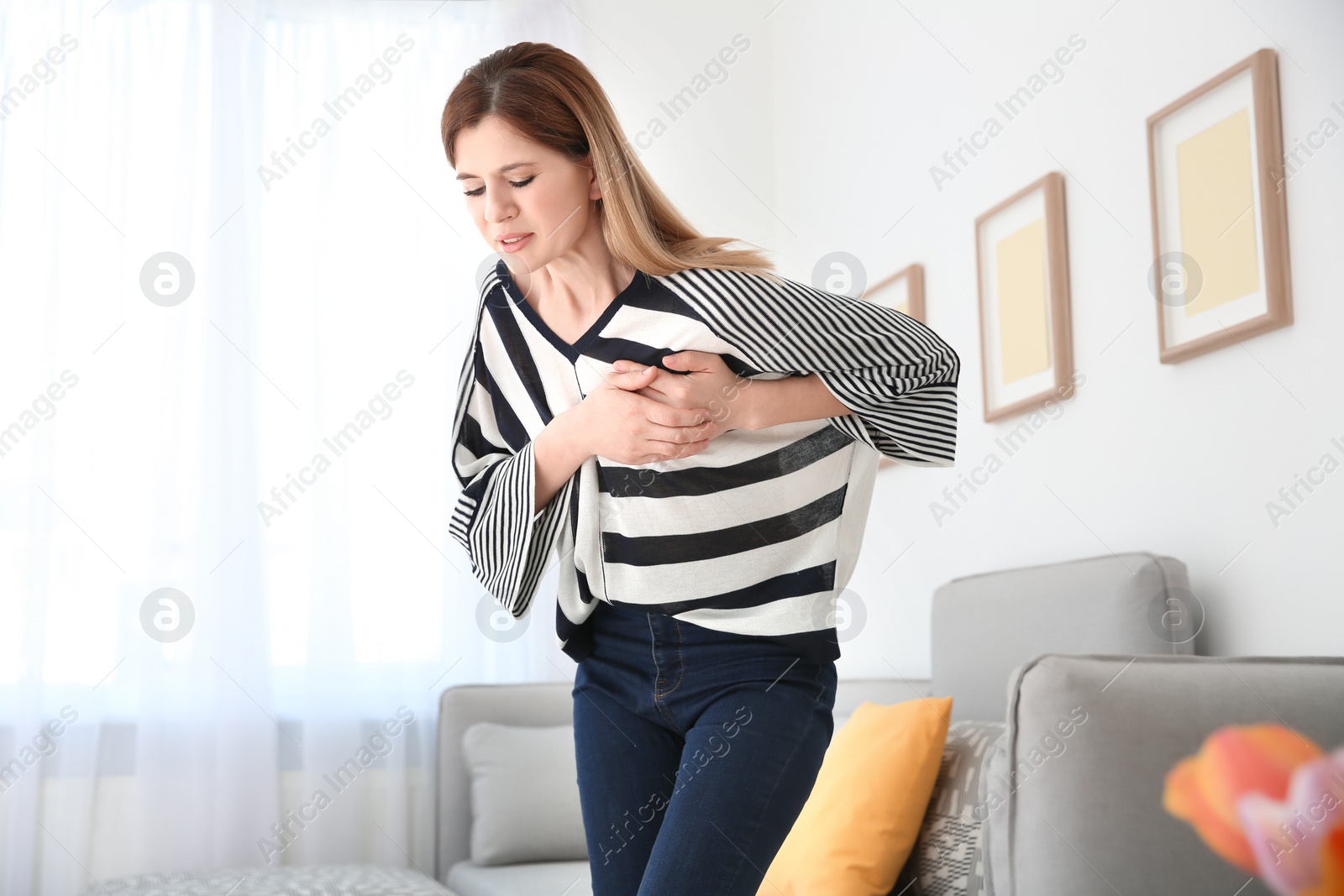 Photo of Woman having heart attack at home