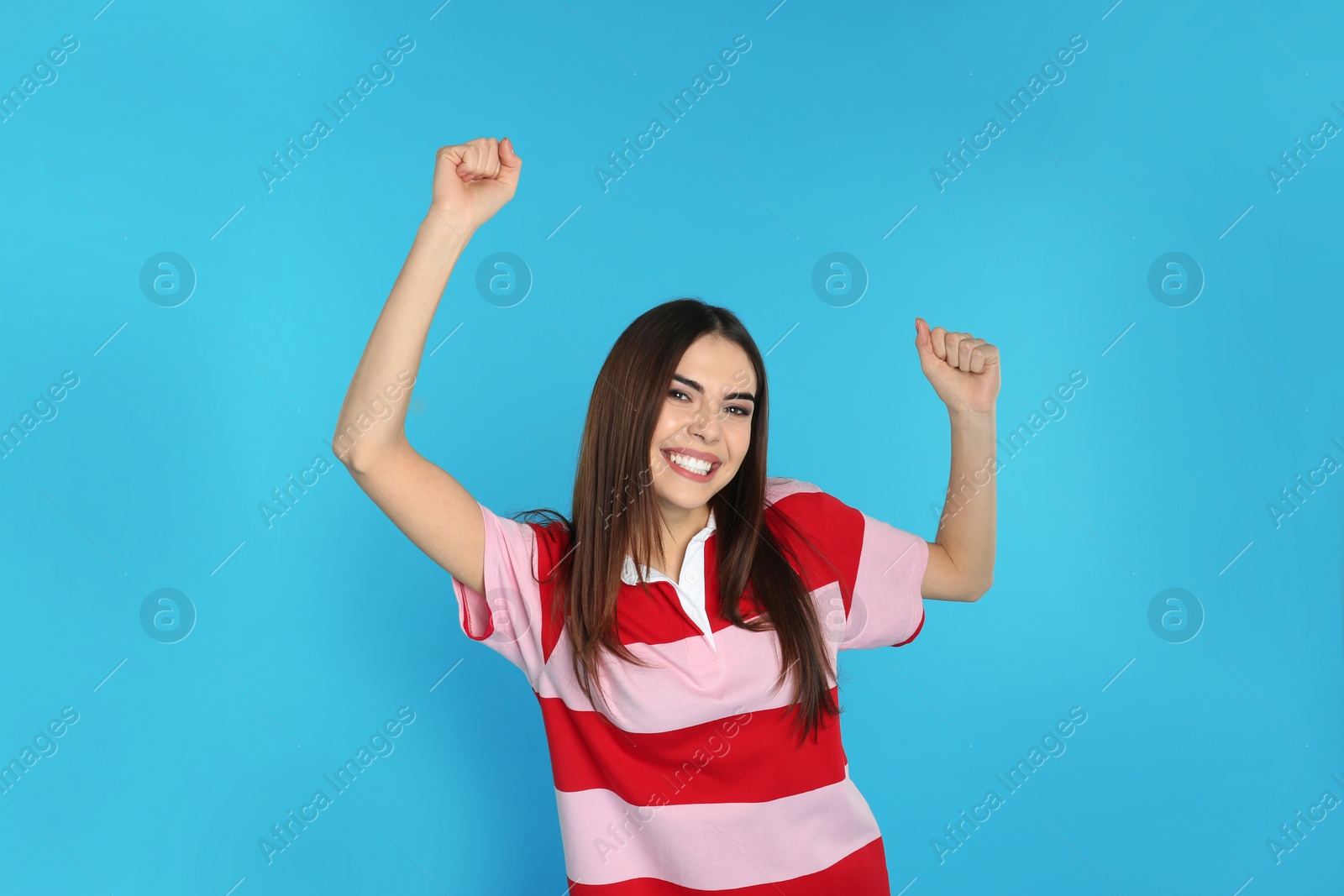 Photo of Portrait of emotional young woman on color background