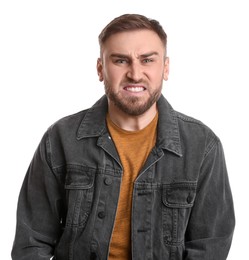 Photo of Portrait of emotional young man on white background. Personality concept