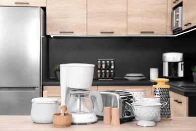 Set with modern domestic appliances in kitchen