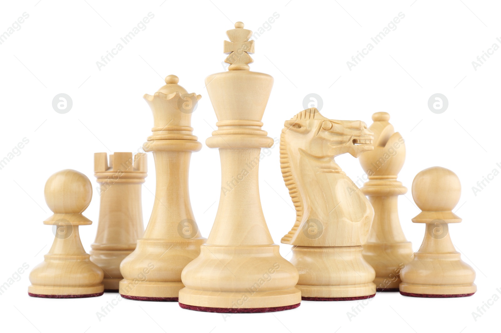 Photo of Set of wooden chess pieces on white background