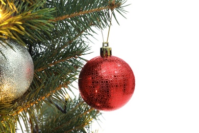 Photo of Christmas tree with beautiful baubles on white background, closeup