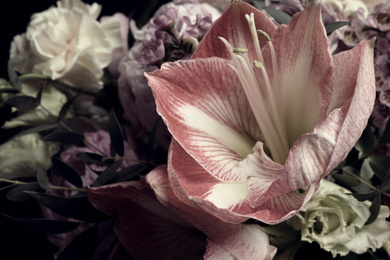 Photo of Beautiful bouquet of different flowers, closeup. Floral card design with dark vintage effect