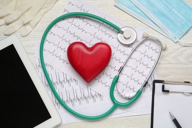 Photo of Flat lay composition with stethoscope and red heart on white wooden table. Cardiology concept