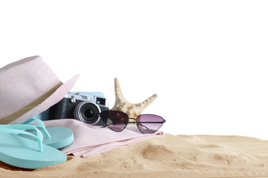 Photo of Composition with beach objects on sand against white background. Space for text