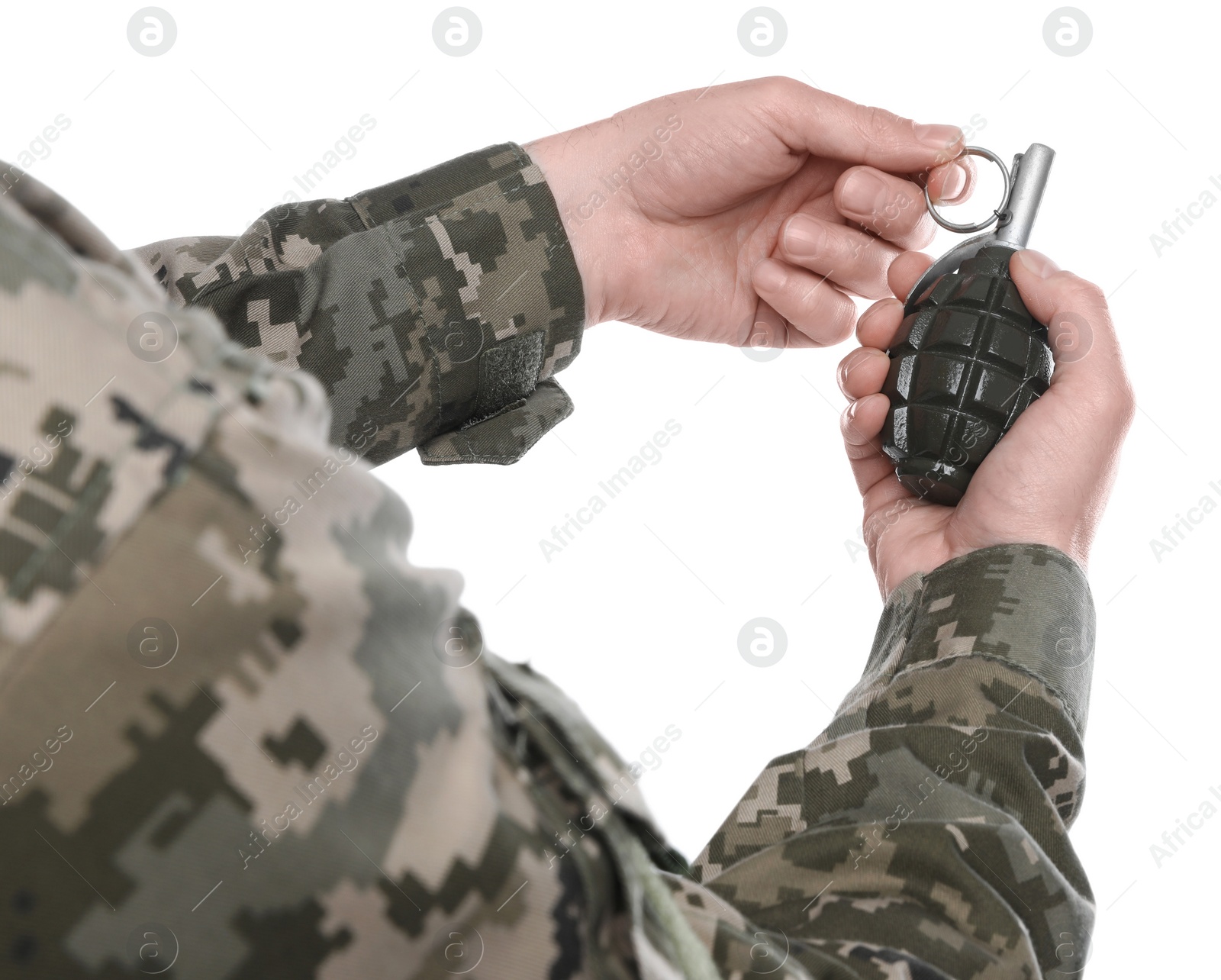 Photo of Soldier pulling safety pin out of hand grenade on white background, closeup. Military service