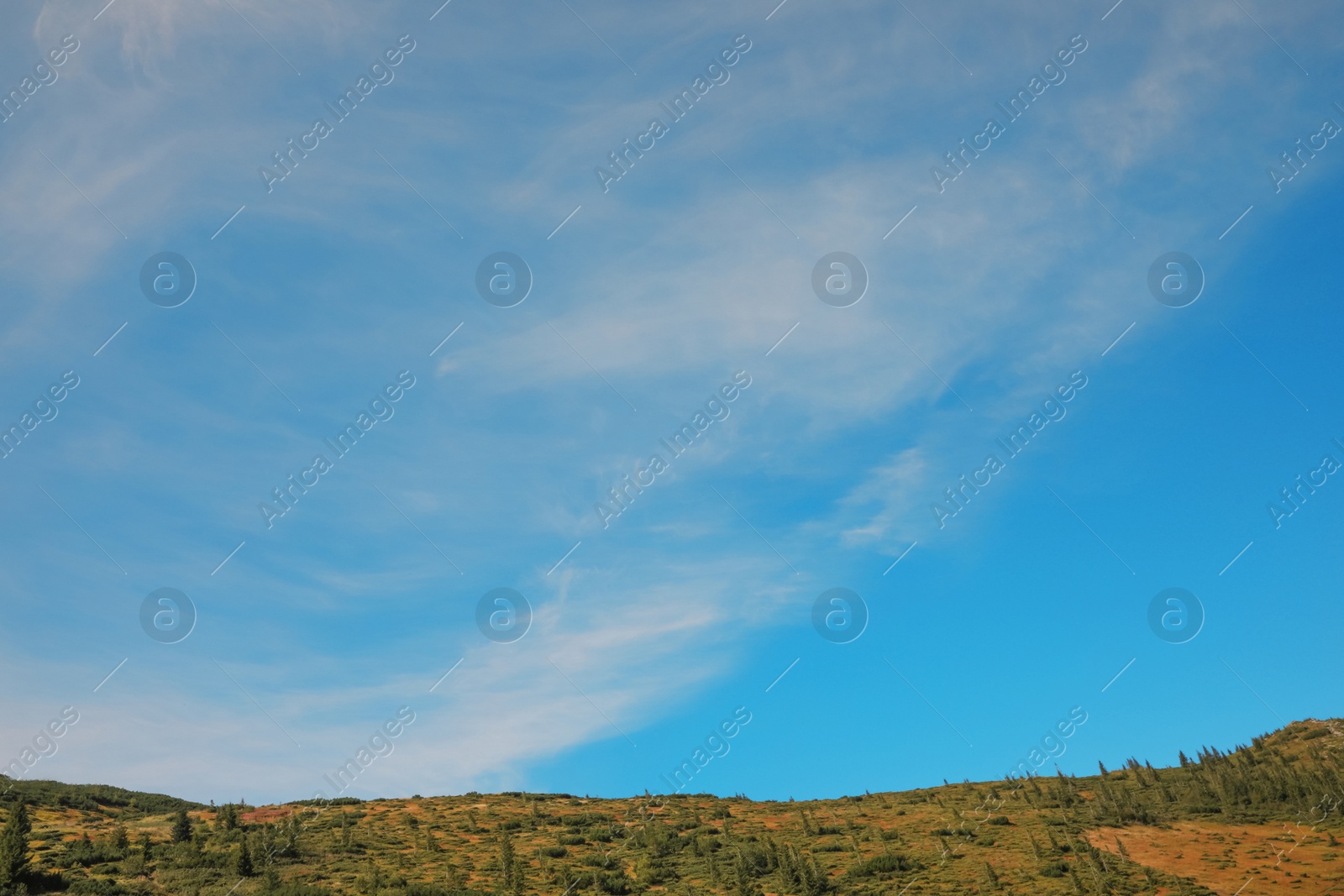 Photo of Picturesque view of sky with clouds over hill