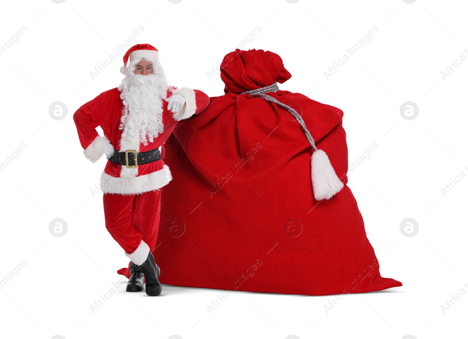 Image of Santa Claus with big red bag full of Christmas presents on white background