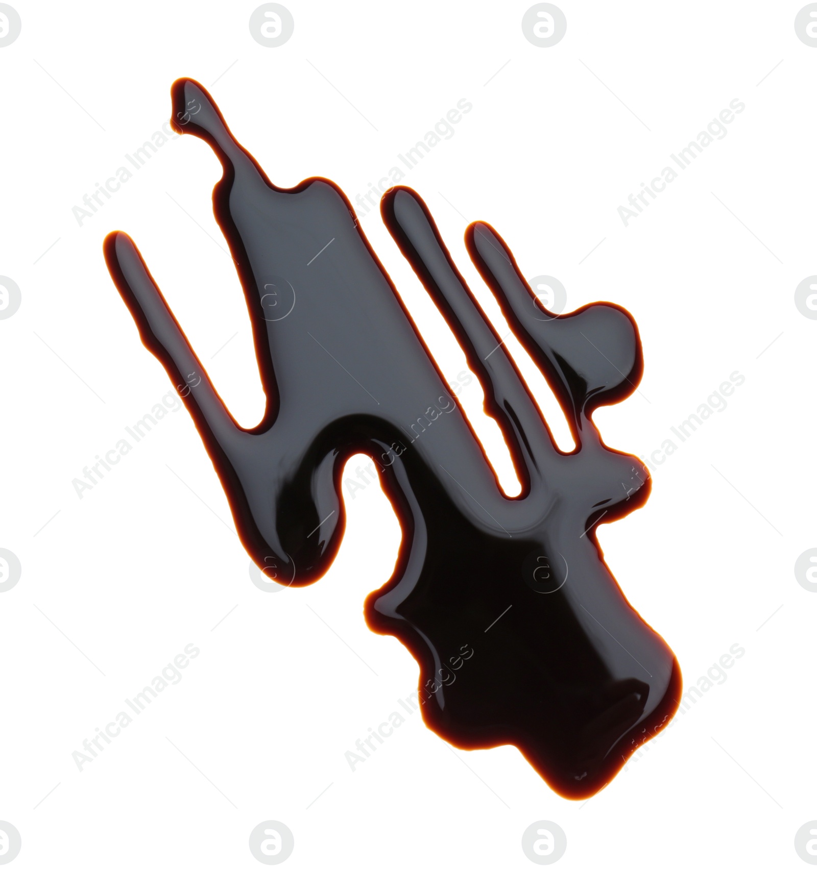 Photo of Spilled soy sauce on white background, top view