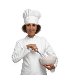 Photo of Happy female chef in uniform holding bowl and whisk on white background